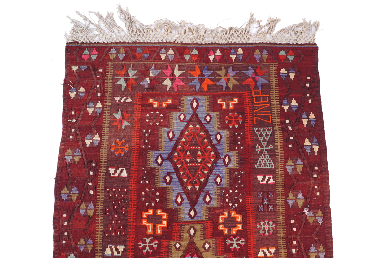 PERSIAN RUNNER red ground with central lozenge decorated field, within a series of outer borders