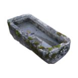 LARGE STONE TROUGH of rectangular form Provenance: The Robinson Collection 29 cm. high; 129 cm.