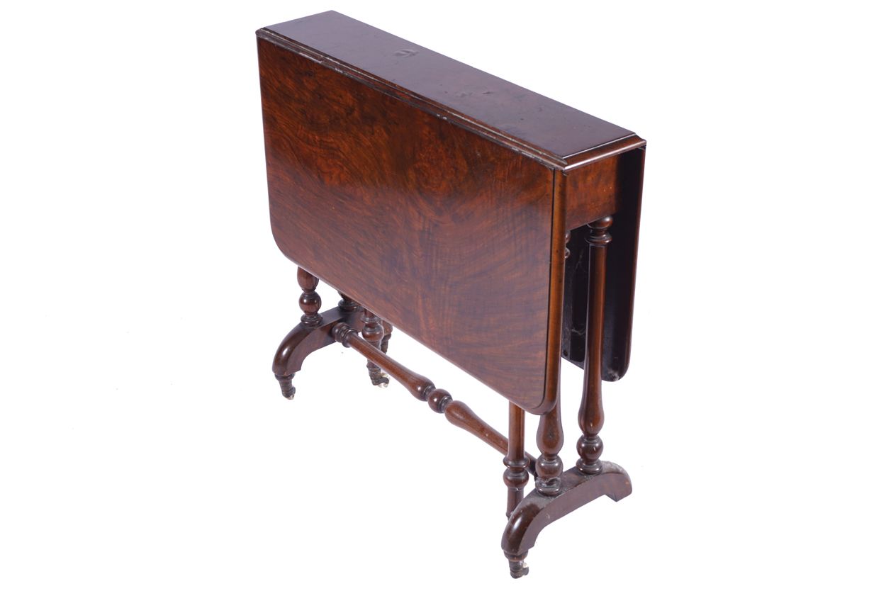 NINETEENTH CENTURY WALNUT YACHT TABLE the elongated rectangular top with drop leaves, raised on