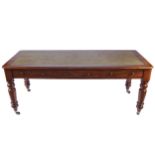 NINETEENTH-CENTURY MAHOGANY LIBRARY TABLE the rectangular tooled leather inset top, with rounded