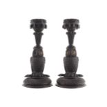 PAIR OF CARVED BOG OAK OWL STEMMED CANDLESTICKS 23 cm. high (2)