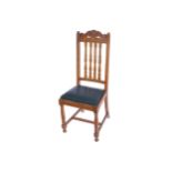 SET OF 4 EDWARDIAN OAK DINING ROOM CHAIRS each with a railed back above a drop in seat, raised on