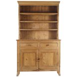 COUNTRY PINE DRESSER the superstructure with a moulded crown above four drawers. The base with two