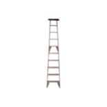 LATE NINETEENTH CENTURY PINE LIBRARY LADDER Provenance: The Robinson Collection 270 cm. high