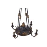 FRENCH EMPIRE GILT BRONZE AND GREEN PATINATED FOUR BRANCH CHANDELIER 85 cm. high; 57 cm. diameter