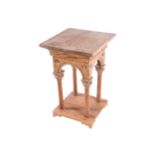 NINETEENTH-CENTURY GOTHIC PINE PLINTH the square top above a conforming frieze and arched apron,