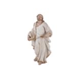 EIGHTEENTH-CENTURY CARVED AND PARCEL GILT FIGURE holding a bible 70 cm. high