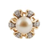 18 CT. PEARL RING surrounded by diamonds Provenance: The Maureen O'Hara Collection Important: Live