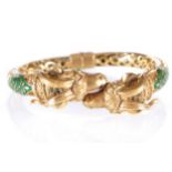 18 CT. YELLOW GOLD FRENCH 1950S ENAMELLED RAM’S HEAD BANGLE with emerald eyes and emerald set head