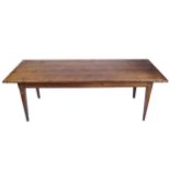 EIGHTEENTH-CENTURY PINE PROVINCIAL FARMHOUSE TABLE the rectangular planked top, with cleated ends,