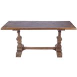 EIGHTEENTH CENTURY OAK REFECTORY TABLE the rectangular plank top raised on square baluster pillar