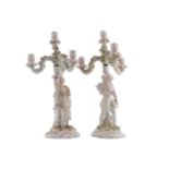 PAIR OF SITZENDORF FIGURE STEMMED CANDELABRA each of three scroll arms 53 cm. high (2)