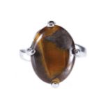 STERLING SILVER RING set with tiger’s eye stone Provenance: The Maureen O'Hara Collection Important: