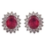 18 CT. WHITE GOLD RUBY AND DIAMOND CLUSTER EARRINGS Provenance: The Maureen O'Hara Collection