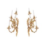 PAIR OF LARGE NINETEENTH-CENTURY GILT BRONZE APPLIQUES each of four scroll arms, framing a