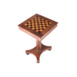 NINETEENTH-CENTURY WALNUT AND CHEQUERED INLAID GAMES TABLE the square top with a reversible centre