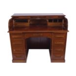 EDWARDIAN MAHOGANY ROLLTOP DESK the rectangular top above a folding tambour front, opening to a