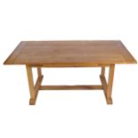 LATE TWENTIETH CENTURY OAK DRAW-LEAF REFECTORY TABLE Willis & Gambier, the rectangular planked top