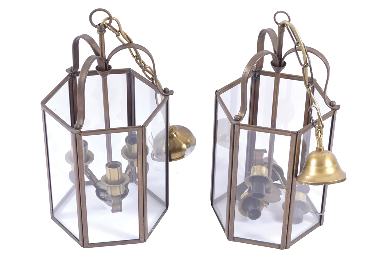 PAIR OF EARLY TWENTIETH-CENTURY BRASS HEXAGONAL SHAPED HALL LANTERNS each with glazed panelled sides