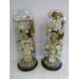 19th century Continental bisque figures under glass domes (A/F)