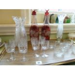 Pair ruby cut glass decanters, vases,