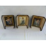 Edwardian highlighted photographic portraits in hanging brass frames mounted in lacquered boxes (3)