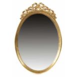 Ovaler Spiegel mit Zierschleife 1. Hälfte 20. Jh., vergoldeter Holzrahmen mit dreifach gekehltem