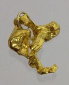 ANHÄNGER MIT FEINGOLDNUGGET Ca. 9,5g A PENDANT WITH FINE GOLD NUGGET Approximately 9.5 g