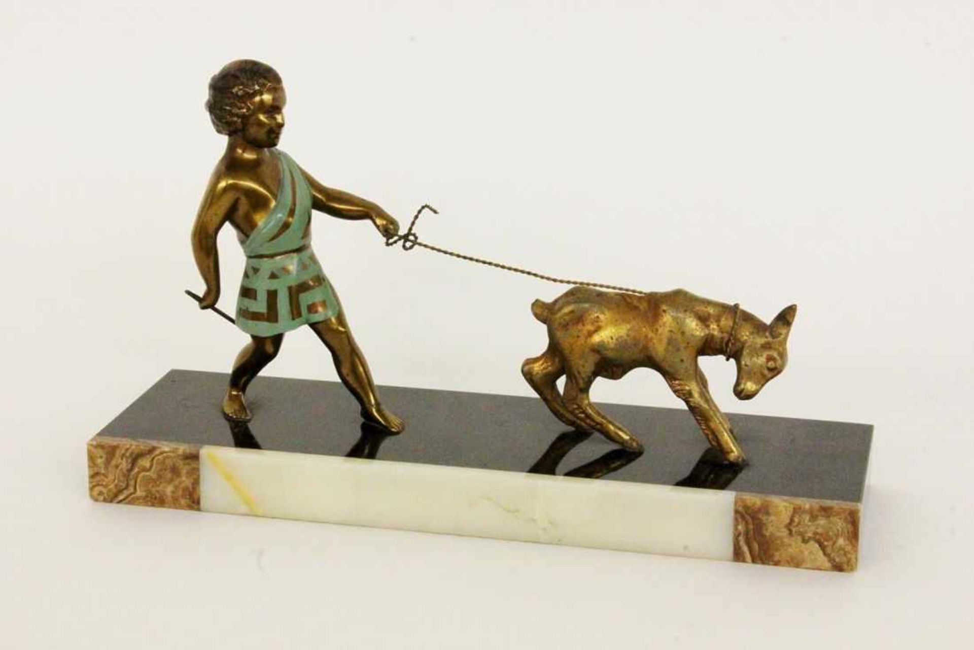 ZIEGENHIRTE G. Lacroix, 20.Jh. Art Deco Figur eines antiken Knaben mit Ziege an der Leine.
