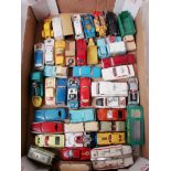 A collection of forty-two Corgi, Dinky and Matchbox diecast model cars and vans, unboxed, playworn