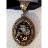 A 19th century Continental Mourning Pendant, oval form in gilt metal, decorated in micro mosaic with