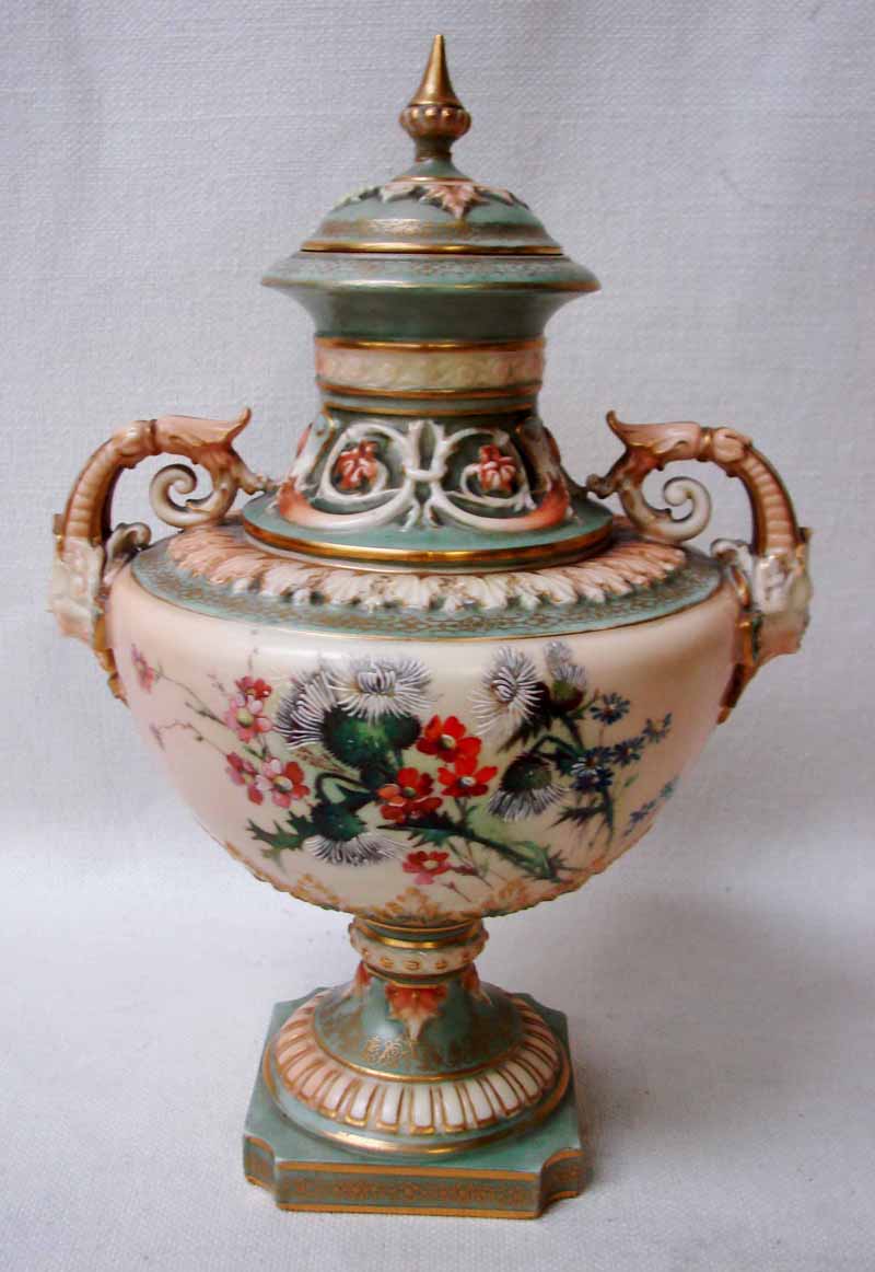 A Royal Worcester blush ivory two-handled Vase and Cover, number 1572, of urnular form, mask