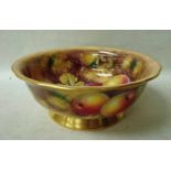 A Royal Worcester Fruit Bowl, painted internally and externally with fruit, on a gilt foot with a