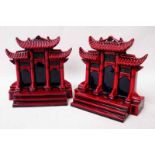 A pair of Royal Doulton flambe Book Ends in the Pilou Gate design numbers BA76 and BA77 modelled