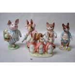 Five Beswick Beatrix Potter figures, each with gold backstamp: Flopsy, Mopsy and Cottontail, Tom