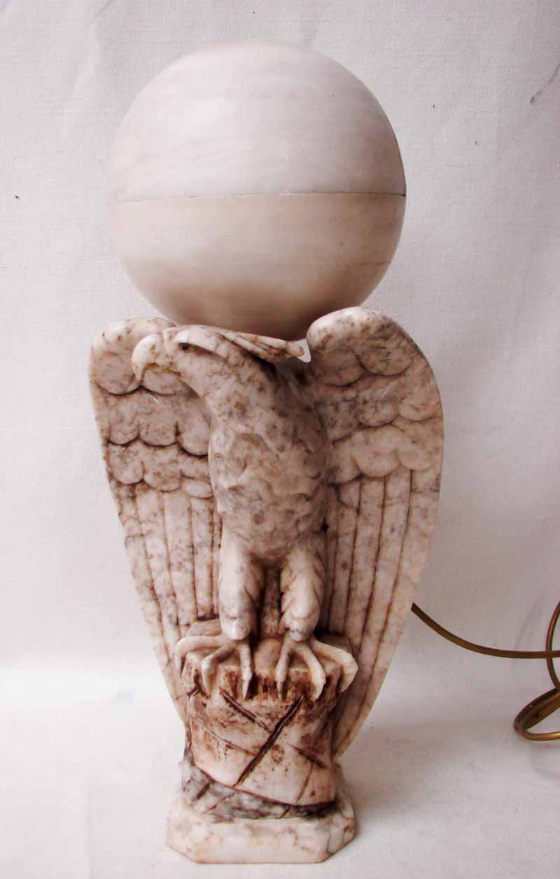 A late 19th century marble sculptural model of an Eagle on a rock, wings outstretched, later
