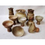 Sheila Casson stoneware: a matching set of seven mottled glaze Goblets, 12cm high, Michael Casson