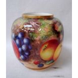 A Royal Worcester Ginger Jar, shape number 2826, painted in the round with fruit on a mossy bank,
