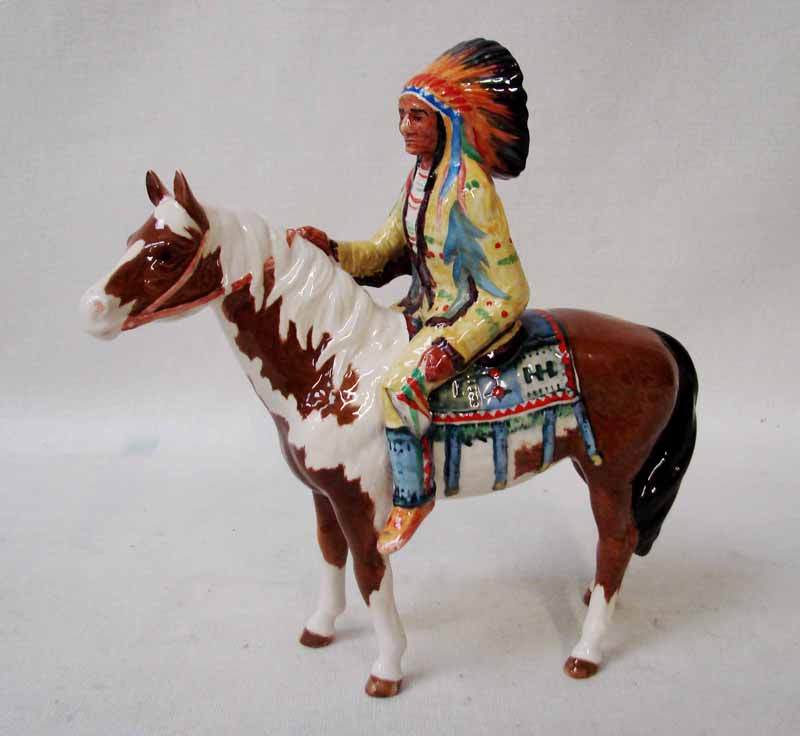 A Beswick pottery model of an American Indian astride a Skewbald Horse number 391
