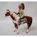 A Beswick pottery model of an American Indian astride a Skewbald Horse number 391