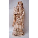 A Chinese 19th century carved ivory figure of a sage in robes holding a fan, one hand missing, 21.