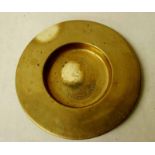 A 19th century Scottish brass Alms Dish of circular form, centrally embossed to the well with a