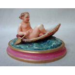 A Rare Royal Worcester 19th century porcelain figural model Boy in a Boat, a nude boy in a small