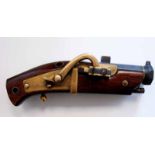 A Japanese possibly late Edo period Matchlock Pistol, 9.3cm octagonal barrel with front sight,