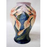 A Moorcroft pottery Vase of baluster form decorated in the Windrush pattern, impressed and painted