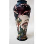 A Moorcroft pottery Vase of baluster form decorated by Rachel Bishop in the Gypsy pattern, impressed