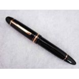 A Mont Blanc Meisterstuck Fountain Pen, model number 149, black case with gilt metal fittings,