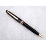A Mont Blanc Meisterstuck retractable Ball Point Pen, black and gilt metal mounted case, white