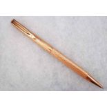 A Waterman 18ct gold Propelling Ball Point Pen, diamond pattern finish to case, 18ct gold pocket