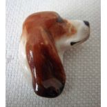 A Royal Doulton pottery Brooch modelled as a Bassett Hound head, 3.7cm long